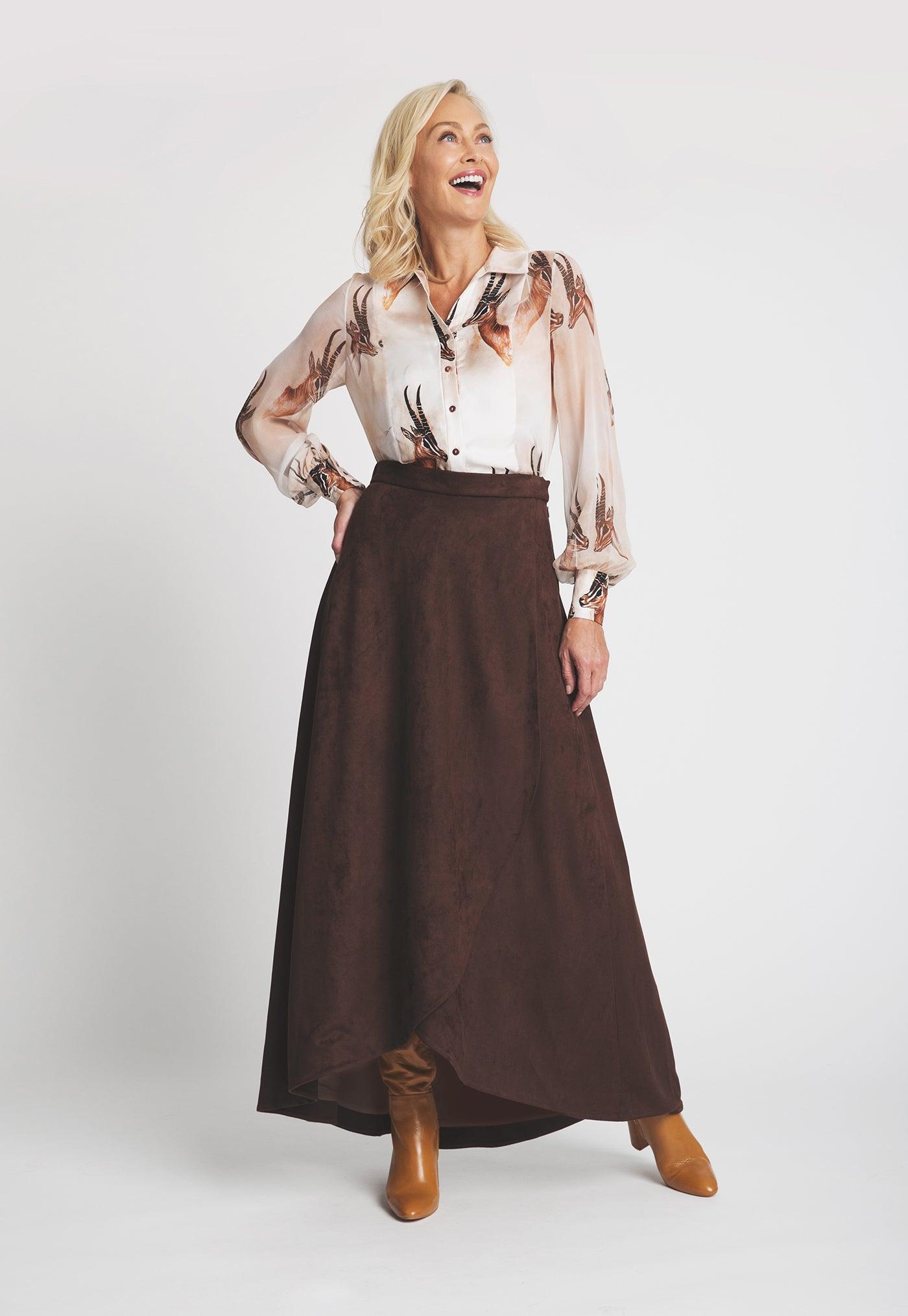 silk bellowed sleeve blouse with antelope print with brown suede long skirt