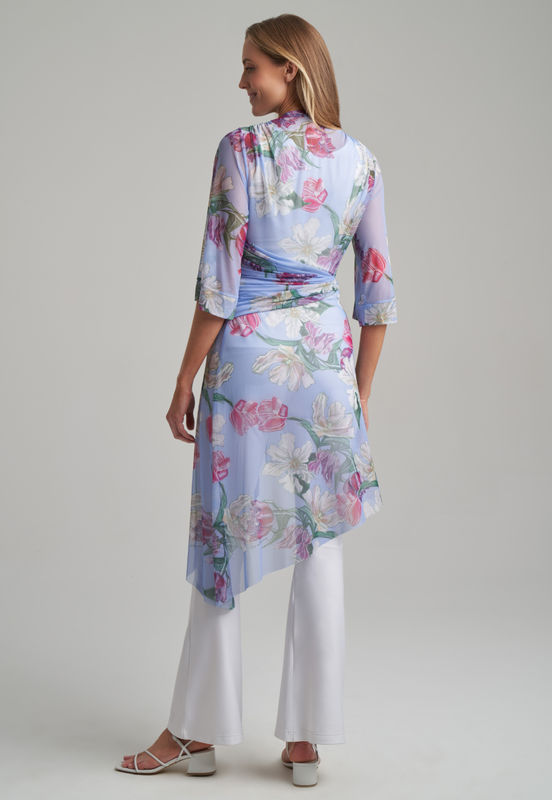 Women wearing mesh tulip printed purple kimono over stretch knit pants and tank top in white by Ala von Auersperg for spring summer 2021
