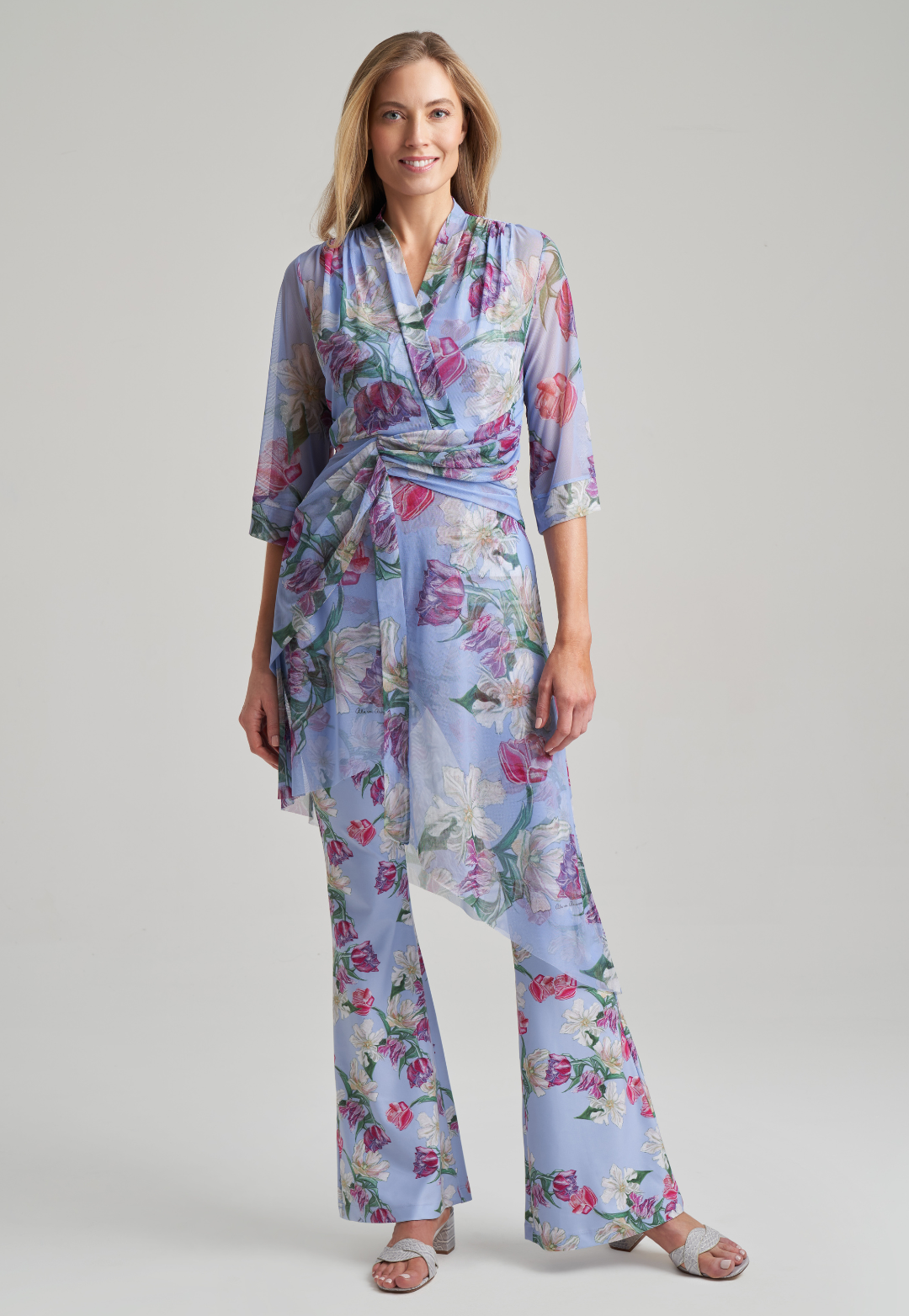 Women wearing mesh tulip printed purple kimono over stretch knit pants and tank top in tulips by Ala von Auersperg for spring summer 2021