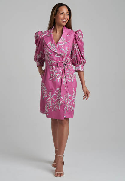 Woman wearing cotton puff sleeved dress jacket in watermelon spider lily print by Ala von Auersperg for spring summer 2021