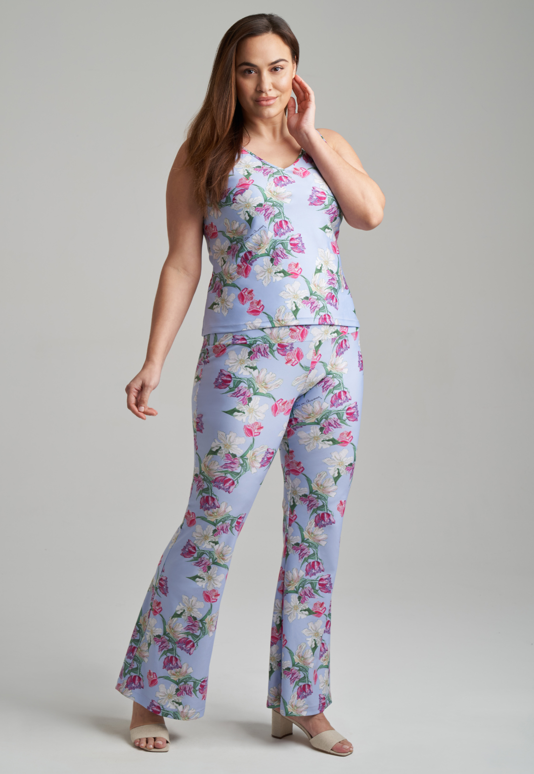 woman wearing stretch knit tank top and stretch knit pants in tulip print by Ala von Auersperg for spring summer 2021