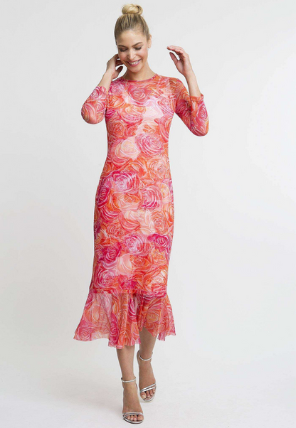 Woman wearing rose printed mesh dress by Ala von Auersperg