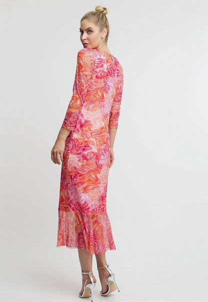 Woman wearing rose printed mesh dress by Ala von Auersperg