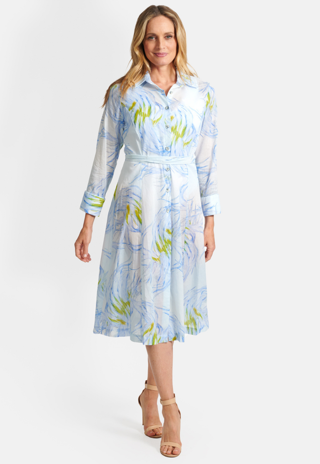 Woman wearing blue feather printed short cotton shirt dress with belt by Ala von Auersperg