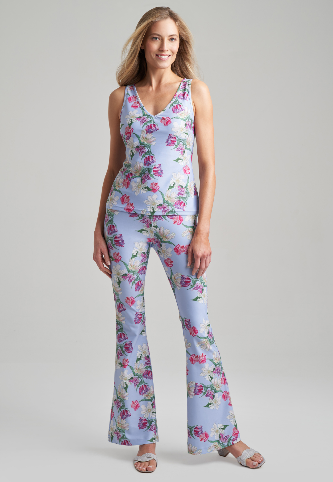Woman wearing stretch knit tulip printed tank top with stretch knit pants in tulips by Ala von Auersperg for spring summer 2021