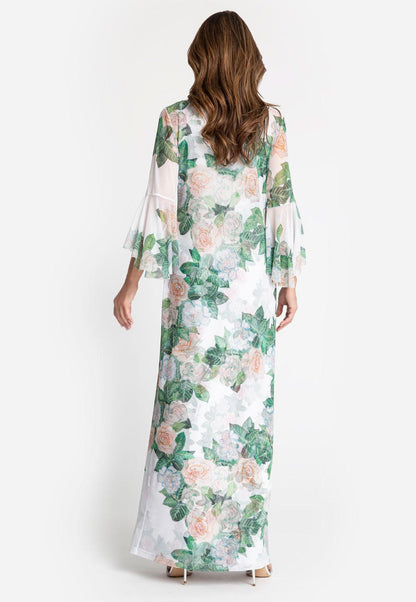 Model wearing mesh long three quartered sleeve gardenia flower printed dress over a long gardenia flower printed stretch knit dress
