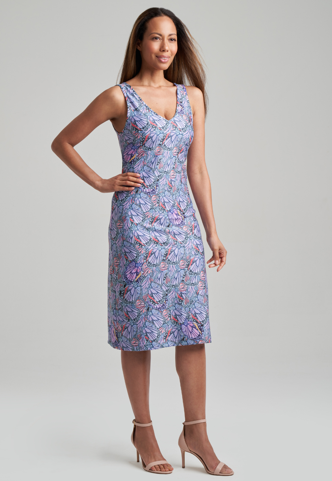 Woman wearing stretch knit butterfly printed short dress by Ala von Auersperg for spring summer 2021