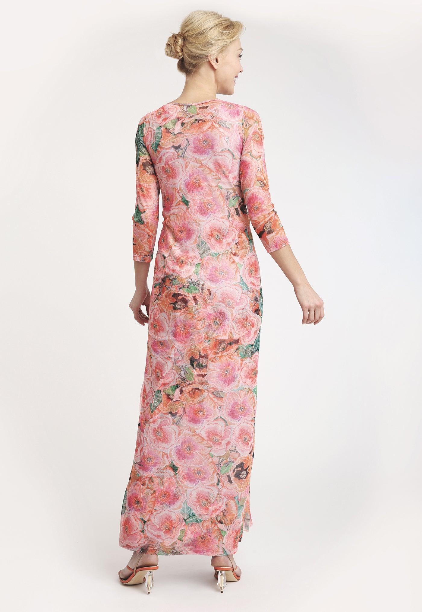 pink and orange floral printed mesh wrap dress layered over long pink and orange long stretch knit dress